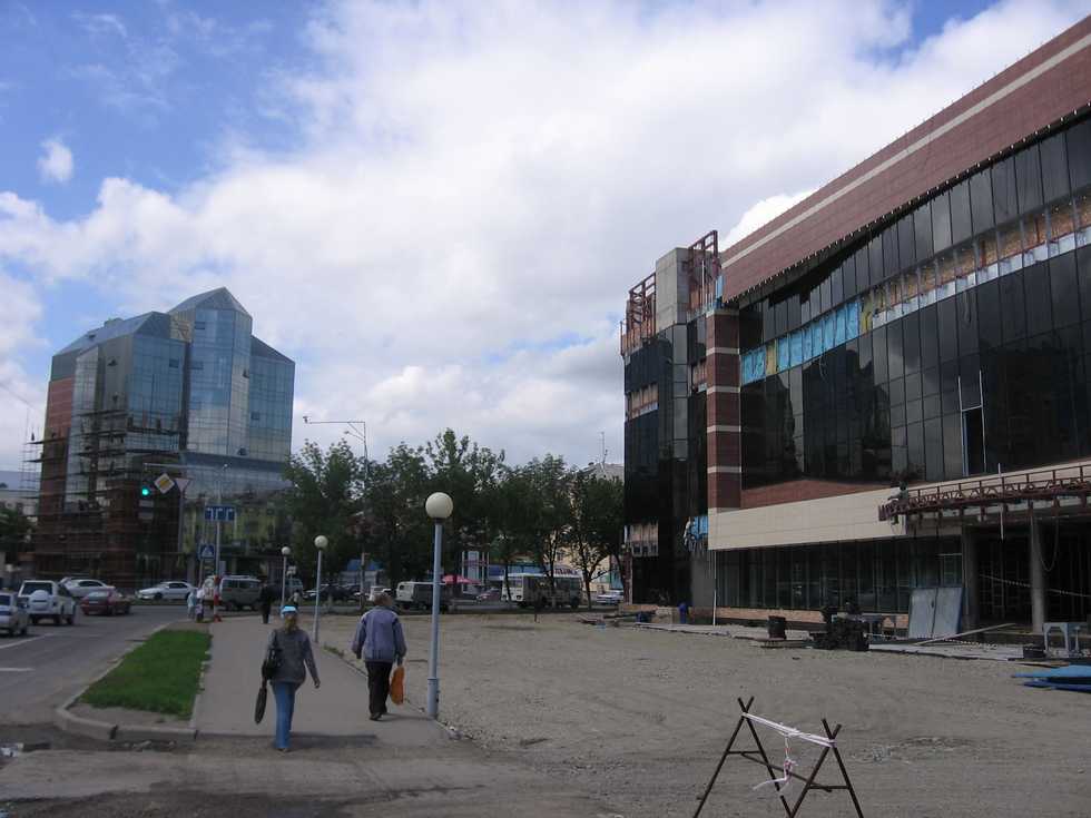 город